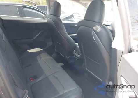 2023 Tesla Model Y Performance Dual Motor All-Wheel Drive z USA, uszkodzony, nr VIN 7SAYGDEF9PF972200